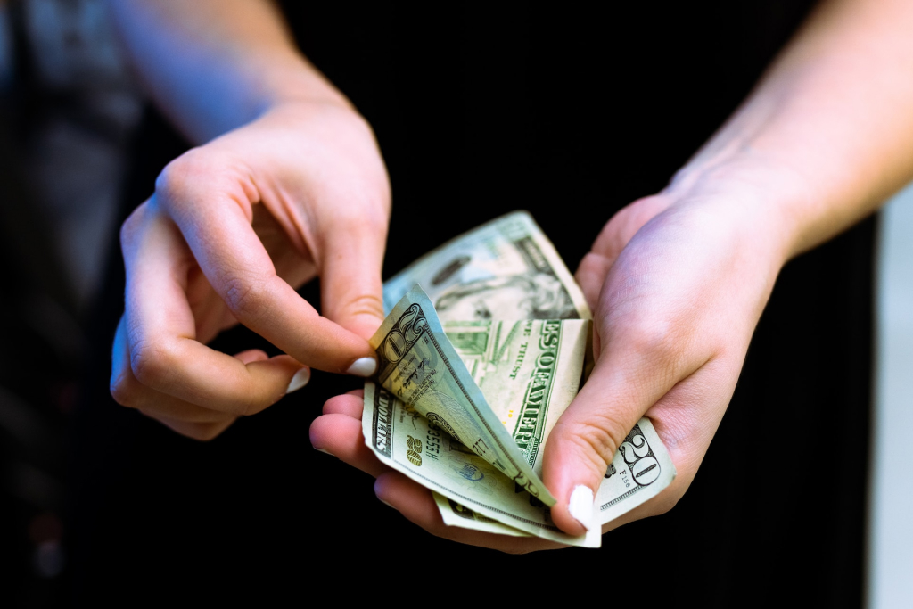 Image of counting cash for the coral gables cost of living Blog Article